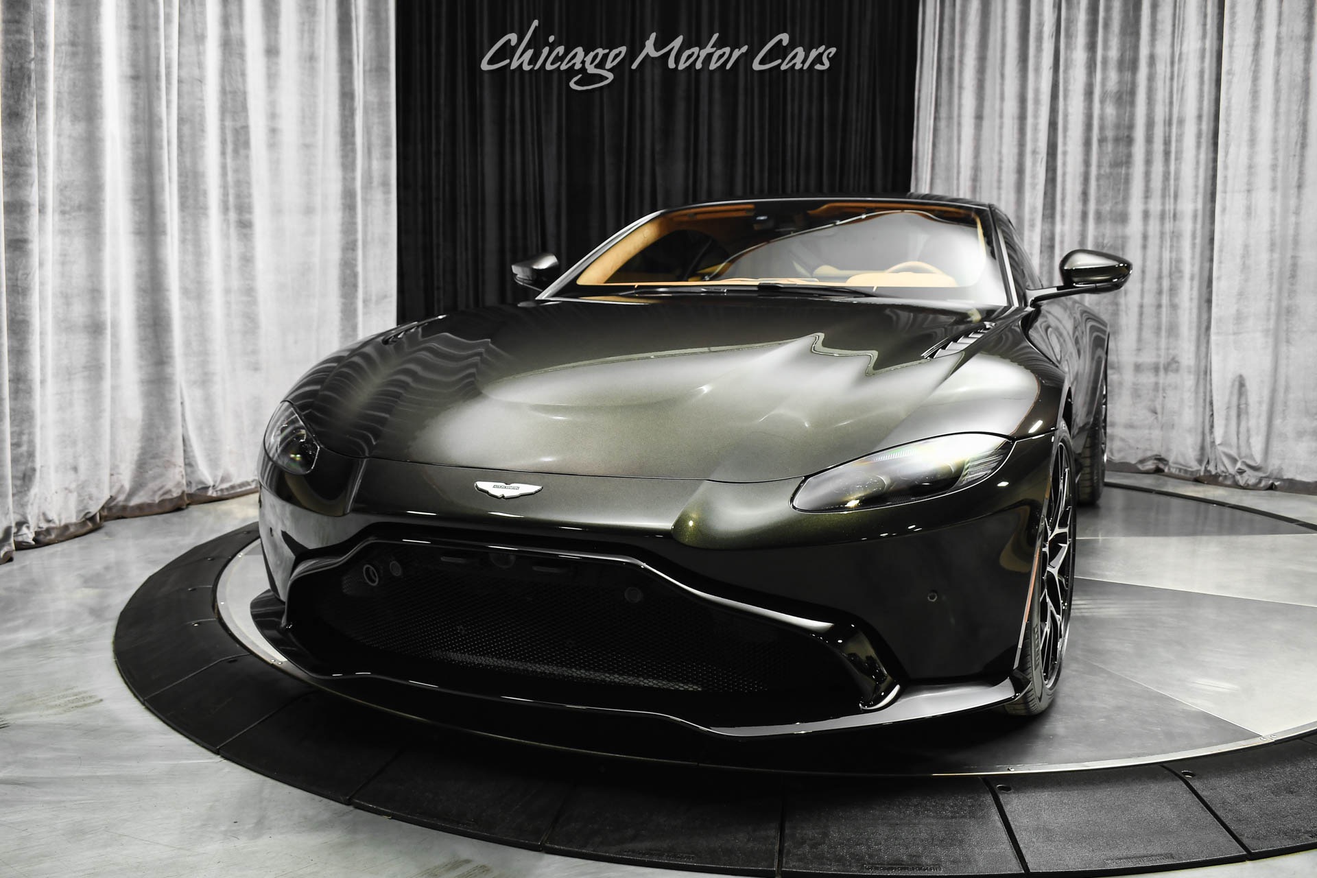 https://www.karmanaperville.com/imagetag/10477/2/l/Used-2021-Aston-Martin-Vantage-Coupe-7-Speed-Manual!-Carbon-Brakes!-Classic-Color-Combo-Only-2k-Miles!-1677612806.jpg